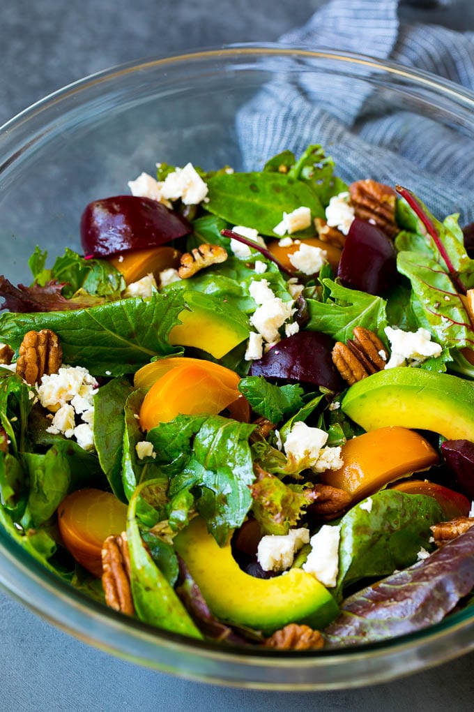 Beet salad with mixed greens, feta cheese and avocado.