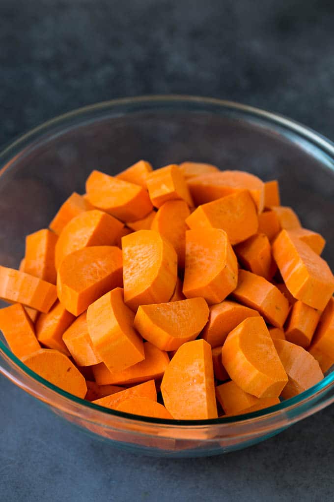 Cut sweet potatoes in a bowl.