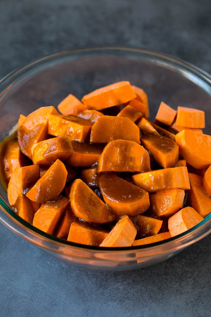 Sweet potatoes drizzled with a butter and brown sugar mixture.
