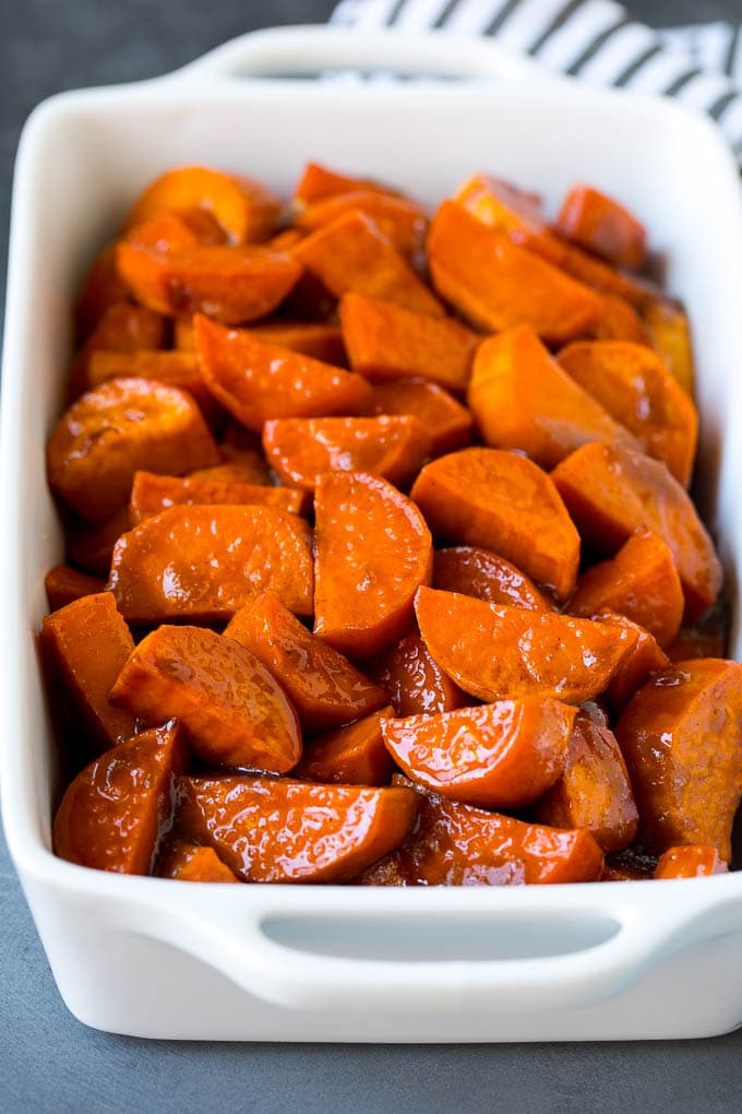 Candied sweet potatoes in a baking dish.