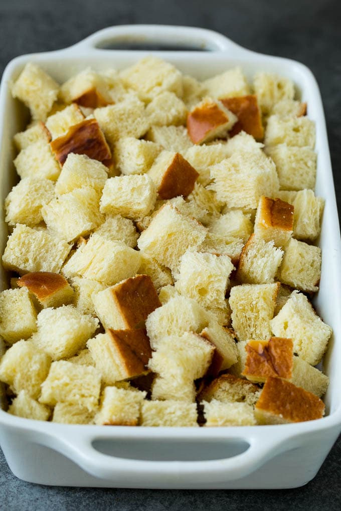 Cubes of bread in a baking dish.