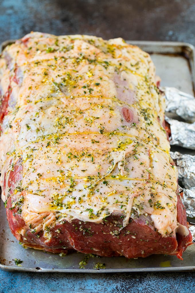 Prime rib coated in garlic, herbs and olive oil.