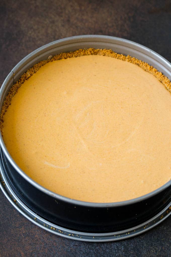 Cheesecake batter in a baking pan.