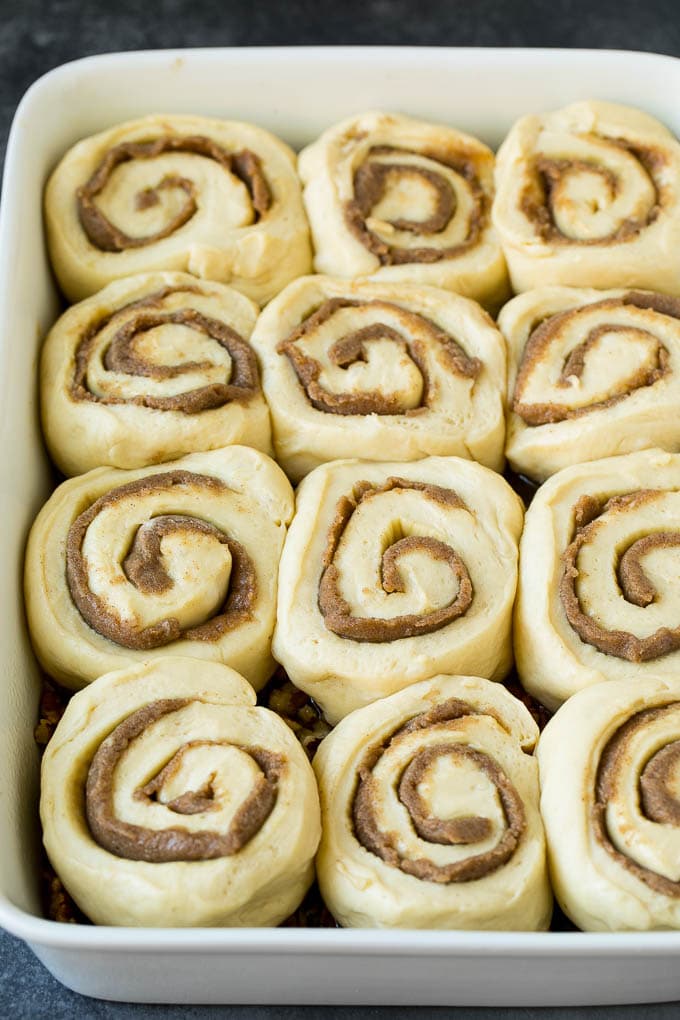 Cinnamon swirl buns in a baking dish.