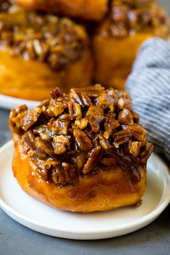 Sticky buns topped with caramel and pecans.