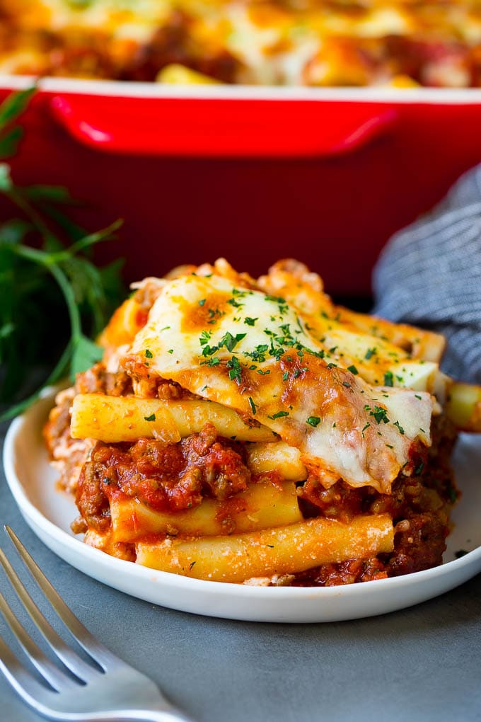A serving of baked ziti with meat sauce and ricotta cheese.
