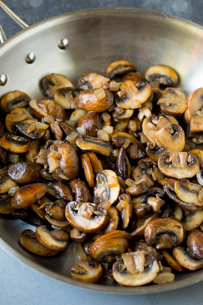 Sauteed mushrooms in a skillet.