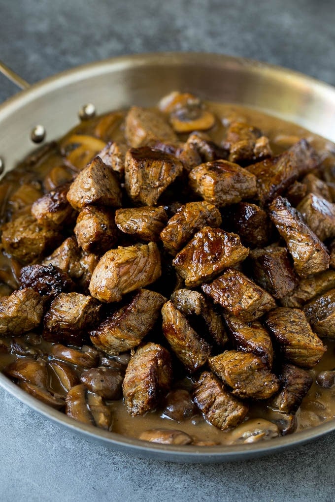 Steak bites in a pool of gravy.