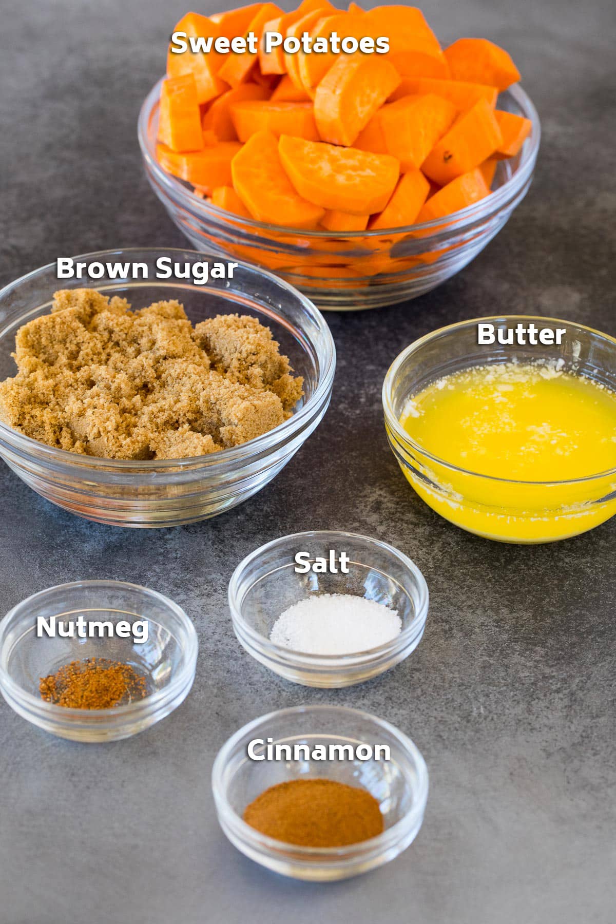 Bowls of ingredients including sweet potatoes, butter, brown sugar and seasonings.