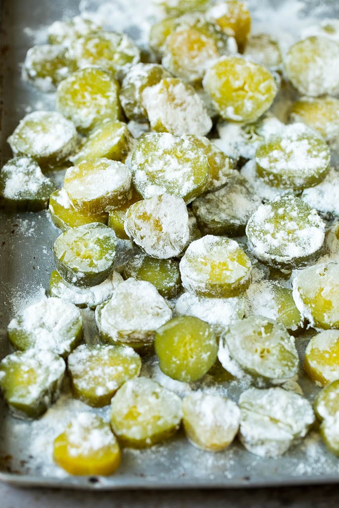 Pickle slices coated in flour.