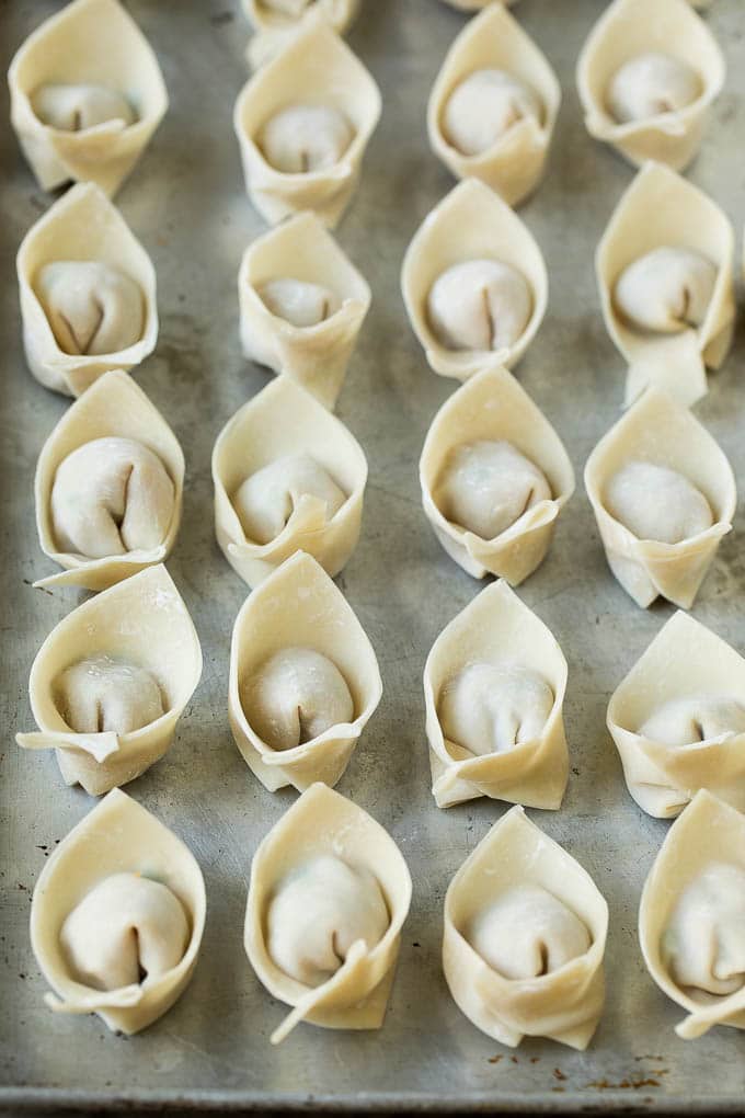 Folded wontons ready to go into the fryer.