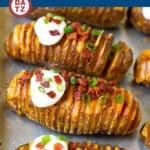 These Hasselback potatoes are thinly sliced potatoes that are roasted to golden brown perfection, then topped with cheese, bacon, sour cream and green onions.