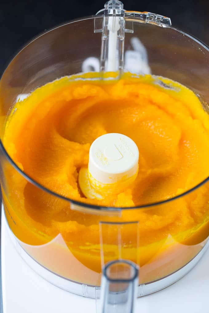 Pumpkin Puree Recipe #pumpkin #baking #fall #thanksgiving #dinneratthezoo Pureed pumpkin in a food processor.