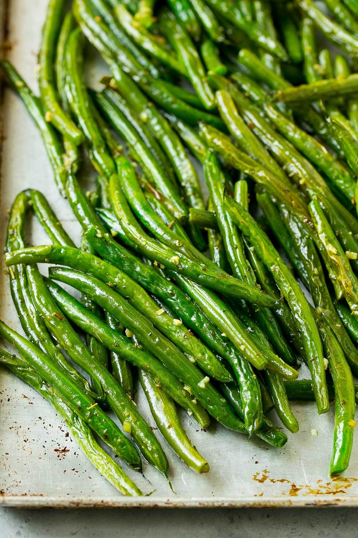 Green beans cooked on a sheet pan.