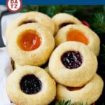 These thumbprint cookies are soft vanilla cookies filled with fruit jam and baked until golden brown.