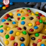 These M&M cookies are made with a soft brown sugar cookie dough and plenty of chocolate candy pieces.