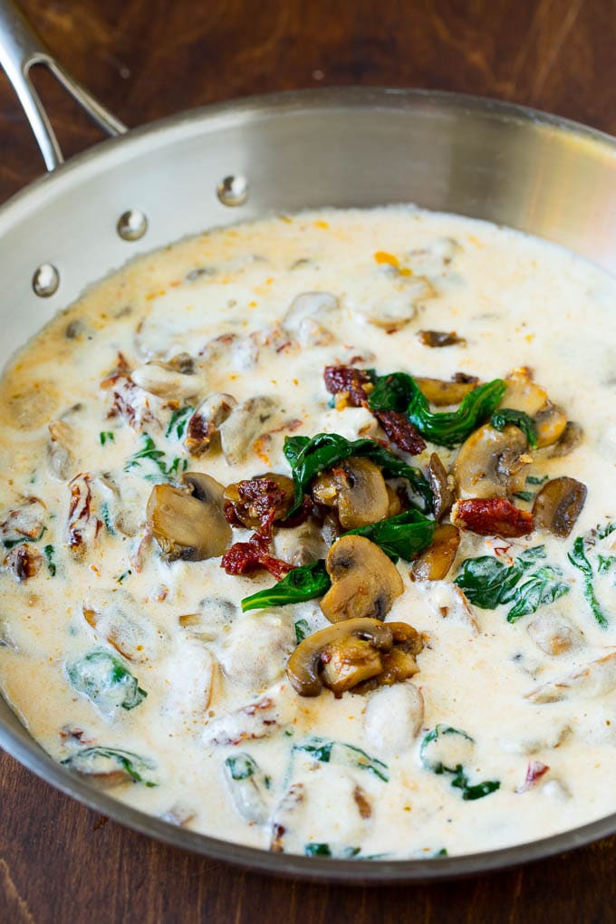 Cream sauce with mushrooms, spinach and sun dried tomatoes.