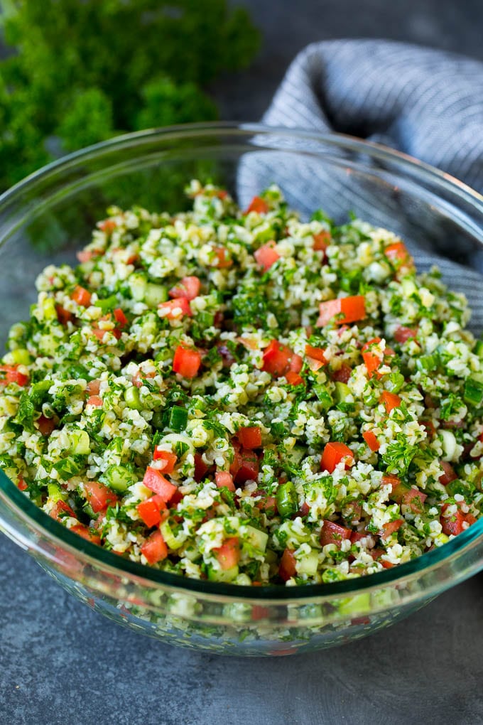 A serving bowl filled with tabbouleh salad.