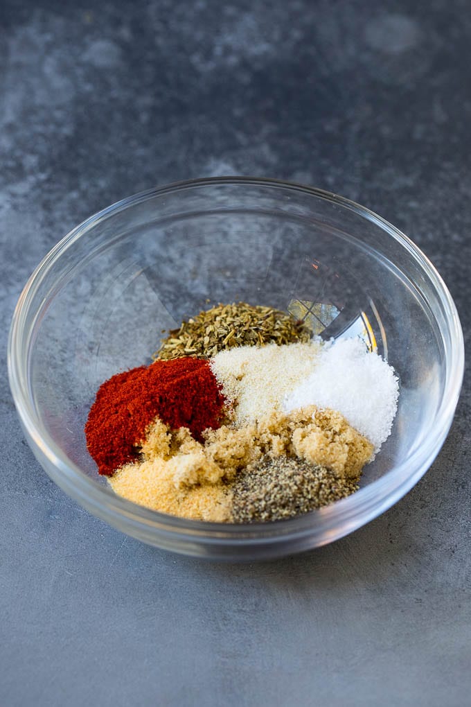 Herbs and seasonings in a mixing bowl.