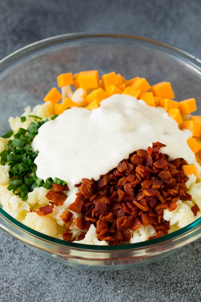 Cauliflower, bacon, cheese and green onions topped with a creamy dressing.