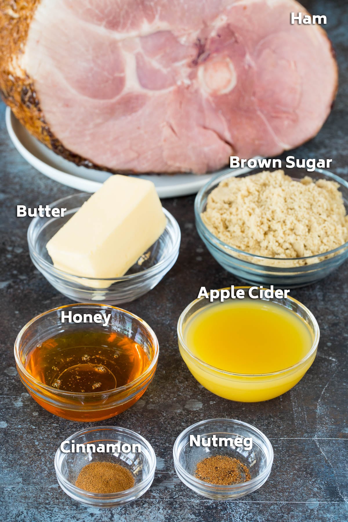 Bowls of ingredients including butter, sugar and seasonings.