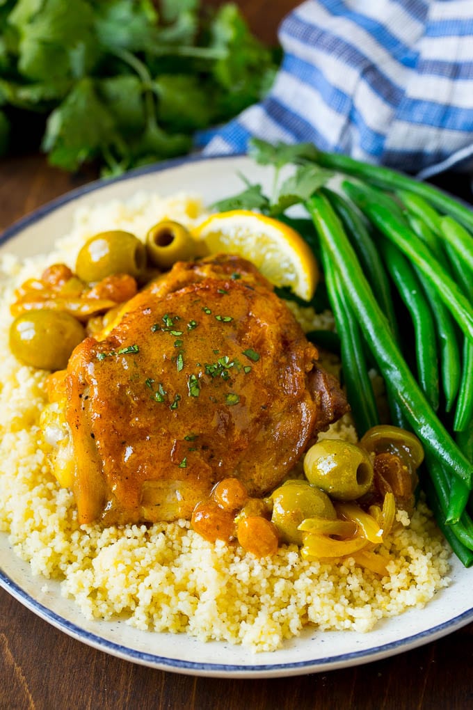 A plate of Moroccan chicken served over couscous.