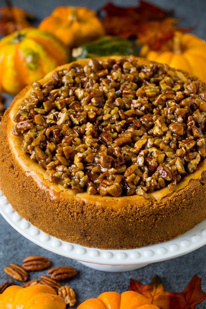 A pecan pie cheesecake topped with a gooey brown sugar glaze.