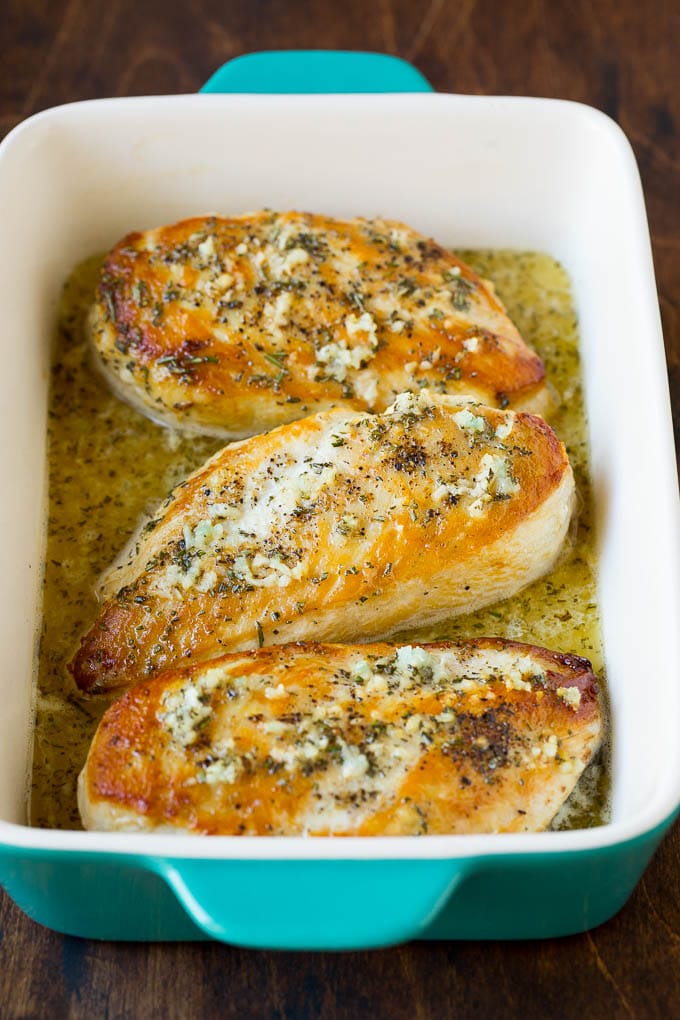 Baked chicken breasts flavored with garlic, butter and fresh rosemary.