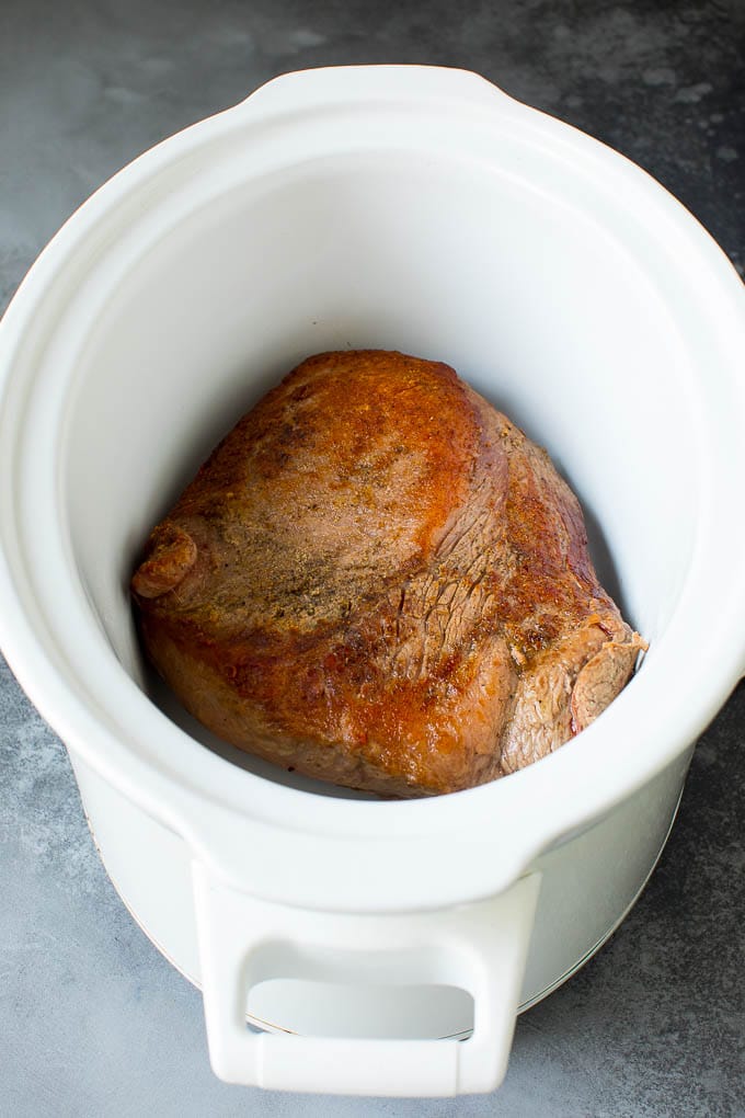 Seared brisket in a crockpot.