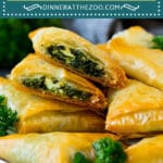This spanakopita recipe is sauteed spinach, feta cheese and seasonings, all wrapped up in phyllo dough and baked until golden brown and crisp.