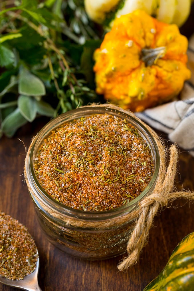 A jar of turkey rub made with brown sugar, herbs and spices.