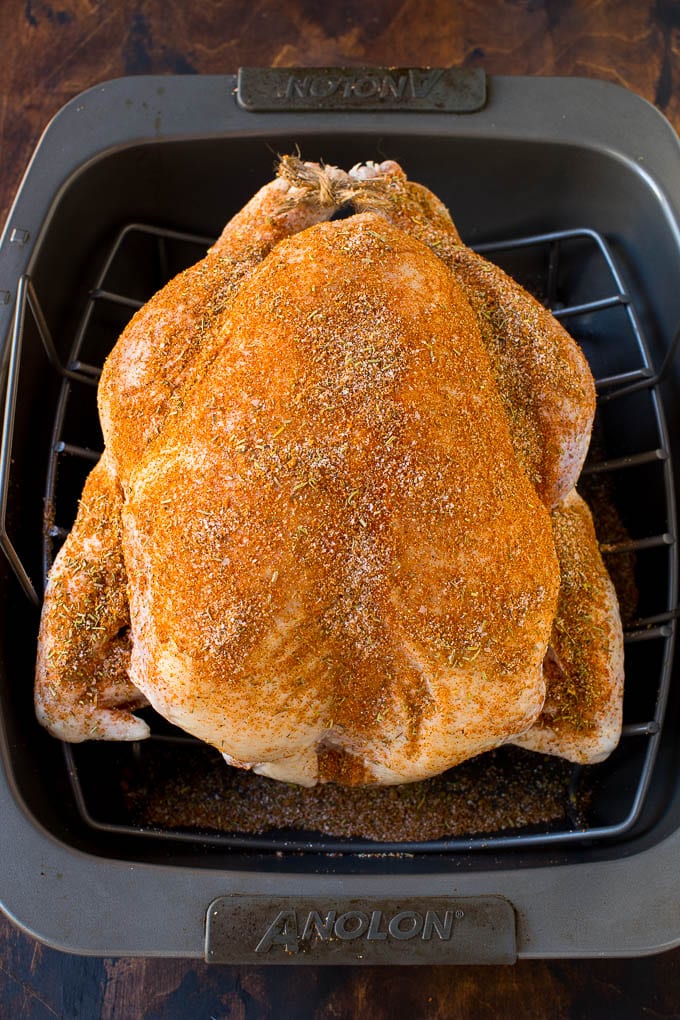 A turkey coated in homemade spice rub.