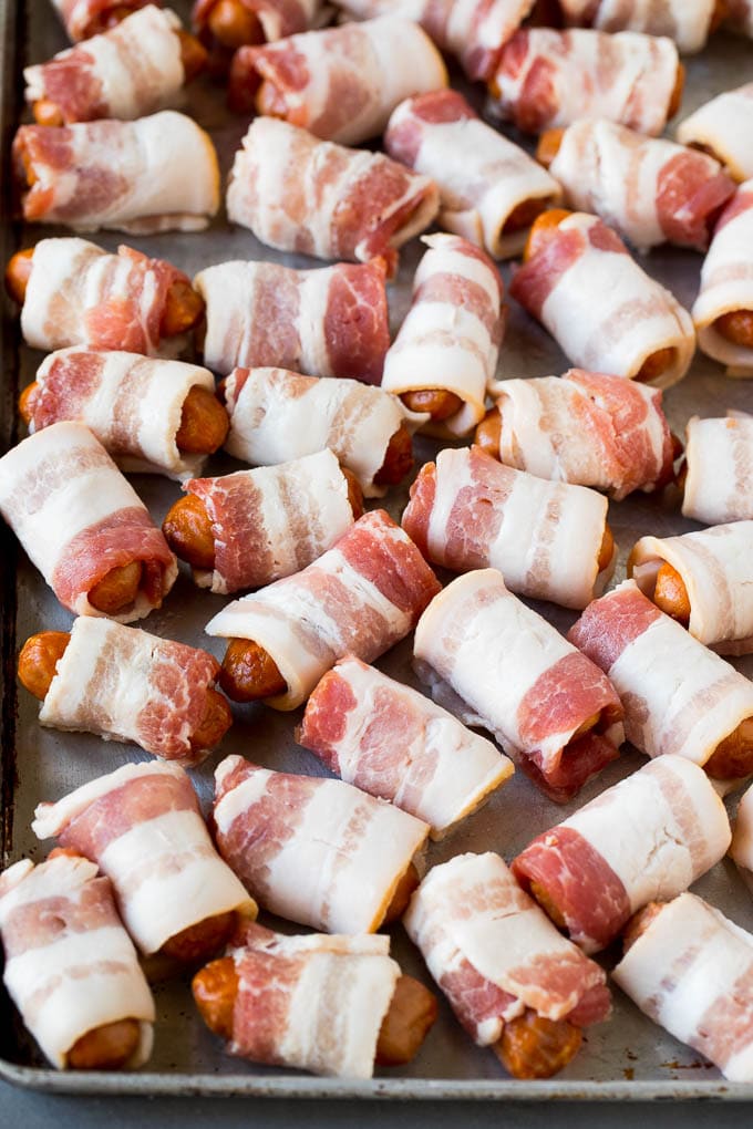 Mini sausages wrapped in bacon.