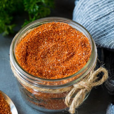 A jar of homemade brisket rub spice mix.