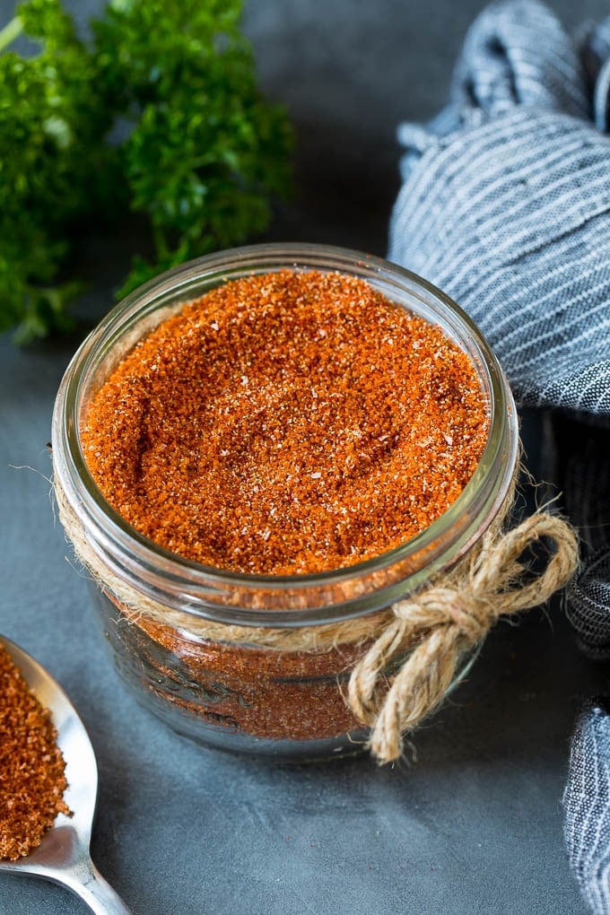 A jar of homemade brisket rub spice mix.