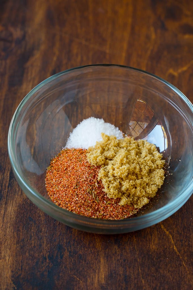 Cajun seasoning, salt and brown sugar in a bowl.