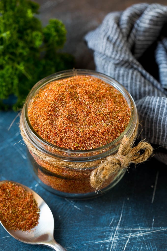 Cajun seasoning in a jar made with a blend of herbs and spices.