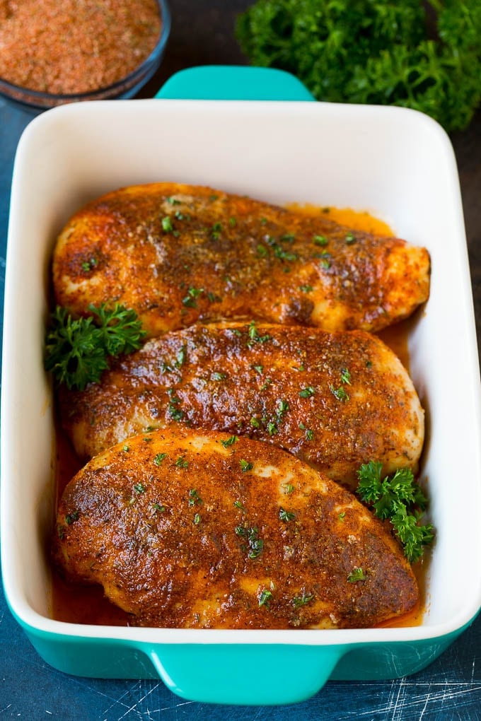 Cajun seasoning on top of baked chicken breasts.