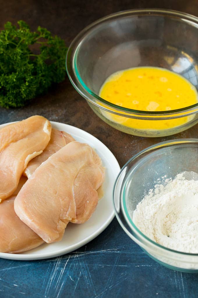 Chicken breasts, seasoned flour and egg batter.