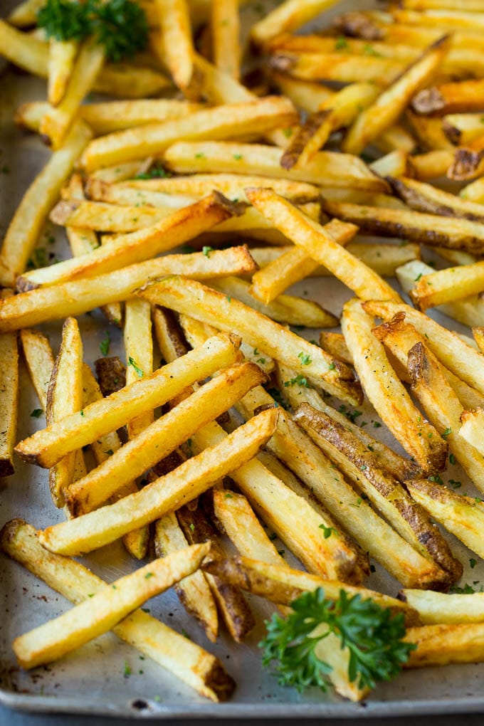 Homemade french fries on a sheet pan.