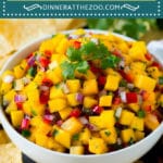 This sweet and savory mango salsa is a blend of juicy mango, peppers, onions and cilantro, all tossed together and seasoned with lime juice.