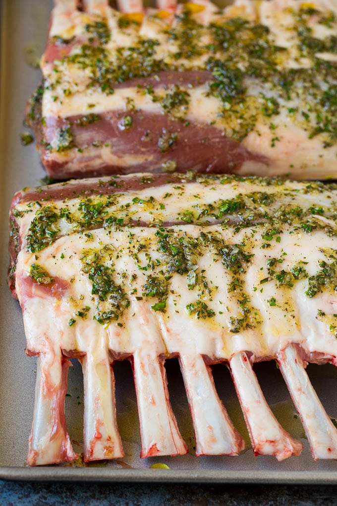 A mixture of olive oil, garlic and herbs drizzled over lamb.