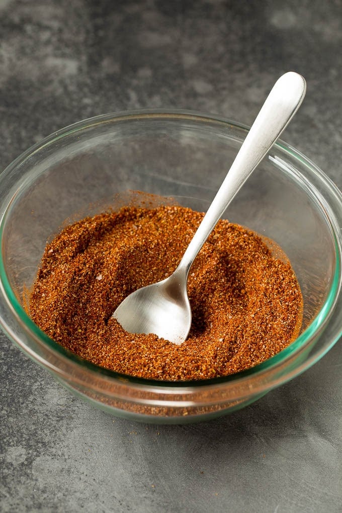 Spices stirred together to make a Mexican seasoning.
