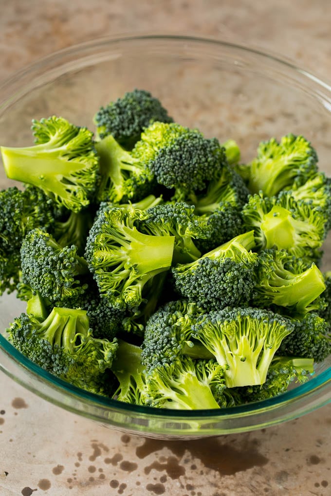 Broccoli florets in a bowl.
