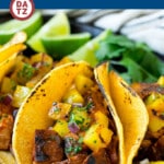 This recipe for tacos al pastor is tender pork in a sweet and savory marinade that is grilled to perfection.