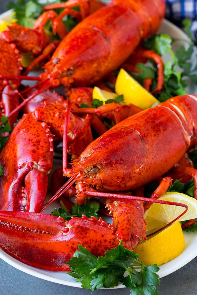 How to cook a lobster with boiled lobsters on a serving platter.