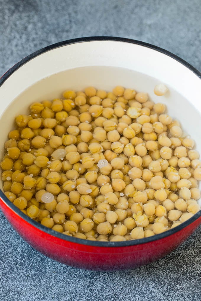 Chickpeas in a pot of boiling water.