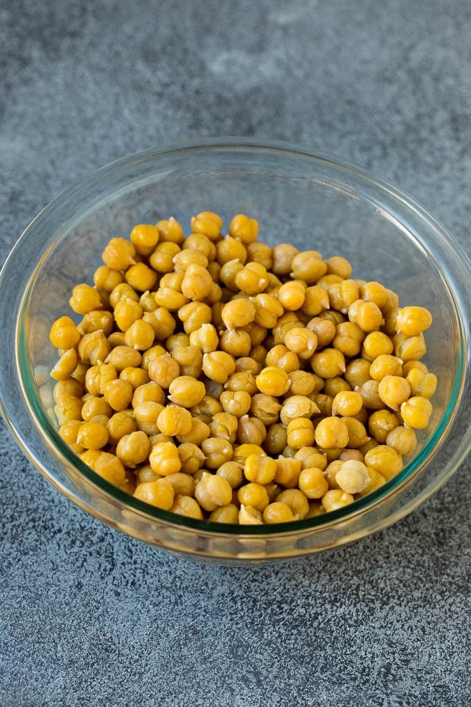 A bowl of boiled and skinned chickpeas.