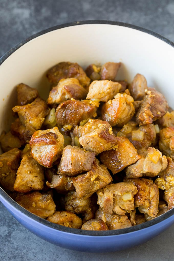 Cubes of pork cooked to a golden brown.