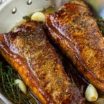 Seared New York strip steak served in garlic butter.